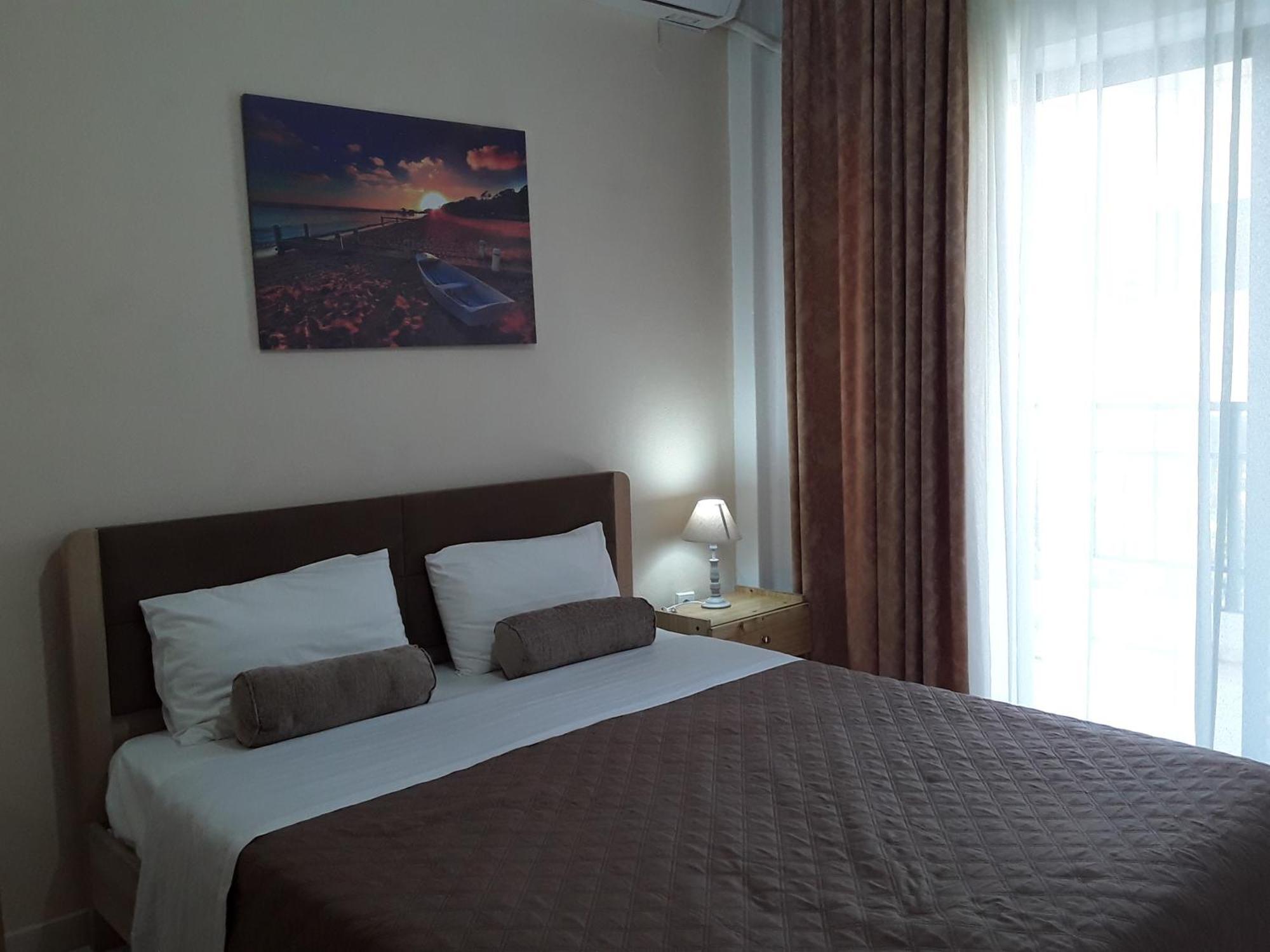 Aparthotel Hause Zorbas Paralia Dionisiou Habitación foto