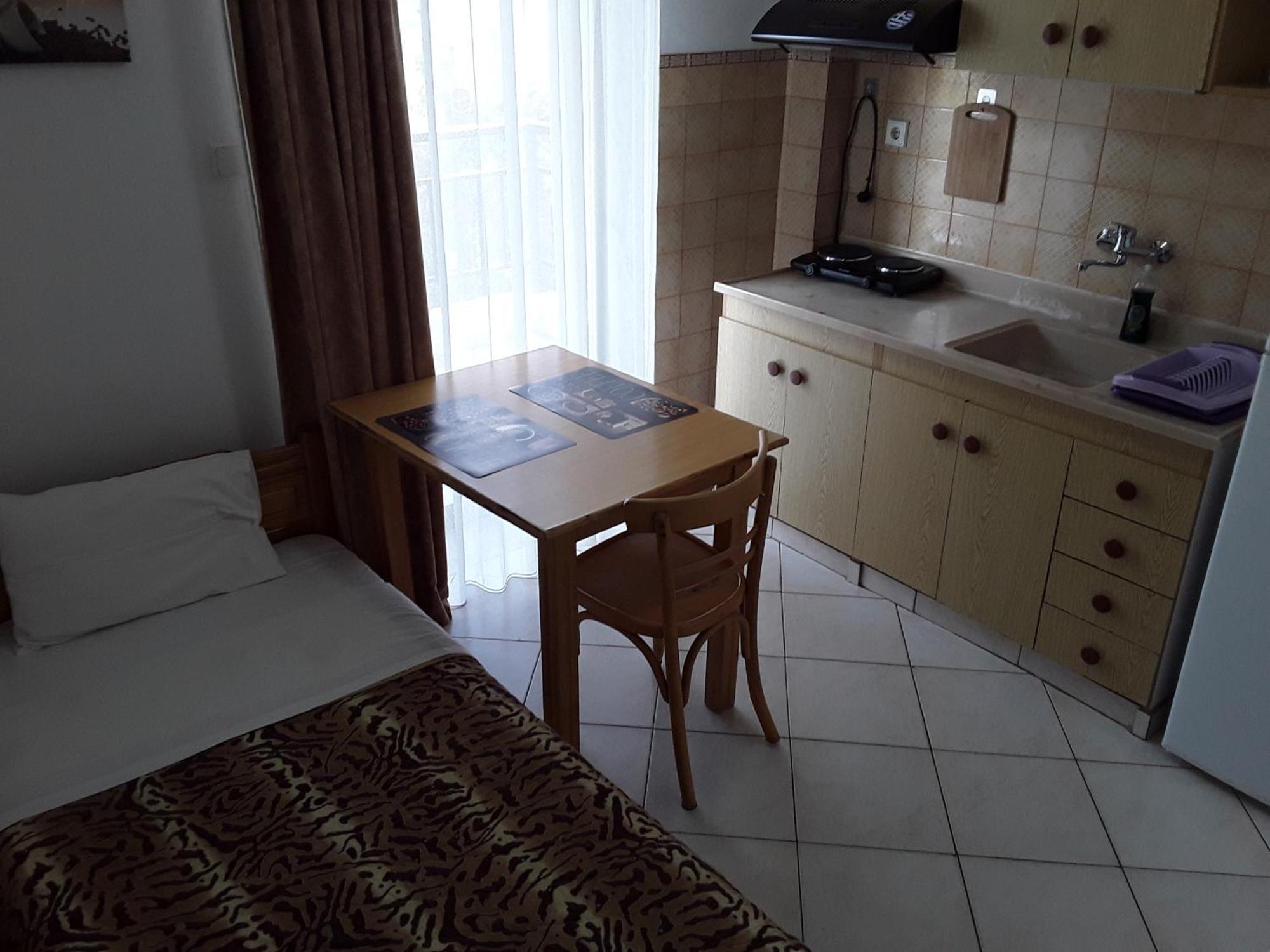 Aparthotel Hause Zorbas Paralia Dionisiou Habitación foto